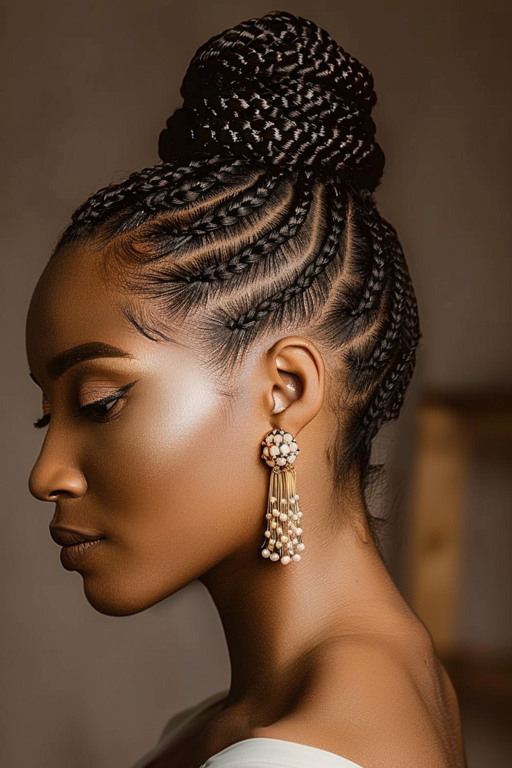 Knotless braids with top bun