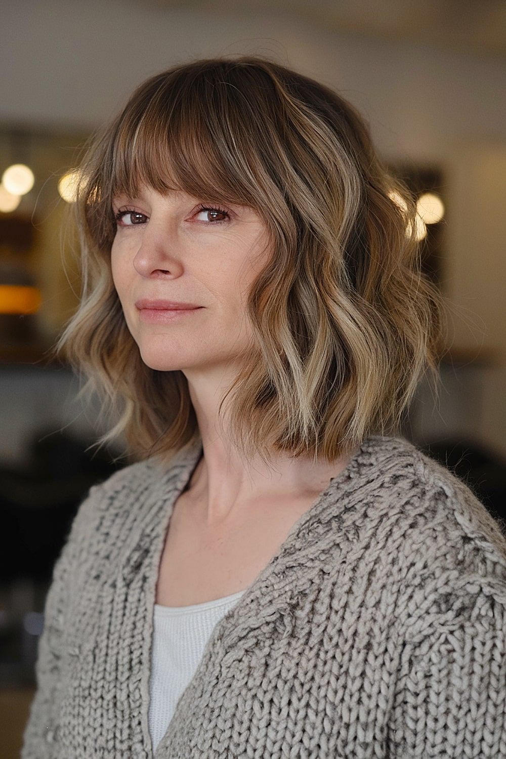 Long bob hairstyle with bangs for fine wavy hair