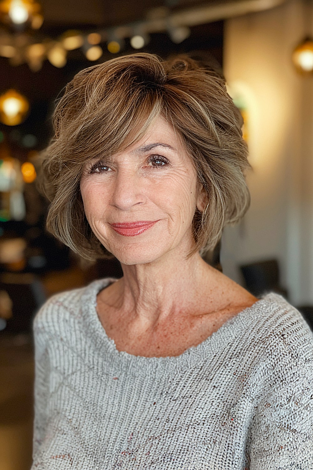 Messy textured bob for an effortless look for women over 60