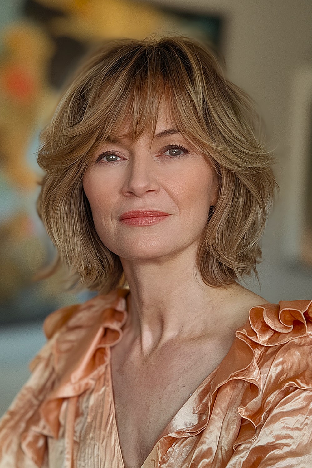 Short feathered bob with wispy bangs